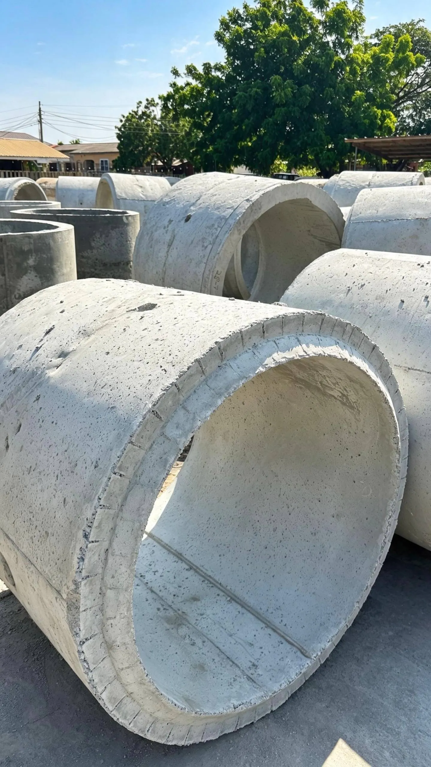 Concrete culvert rings curing in the yard